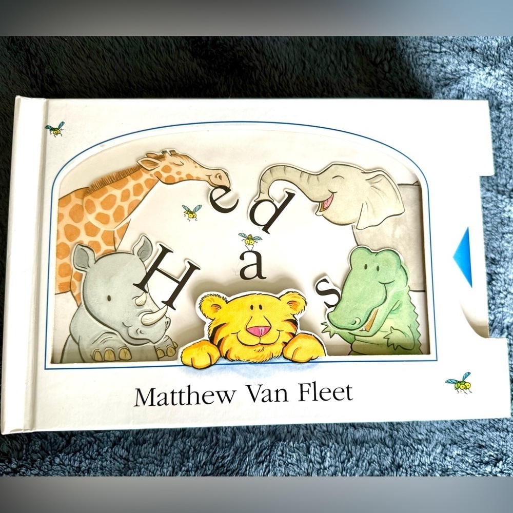 Mathew Van Fleet book with moving parts in fair used condition, has ripped pages